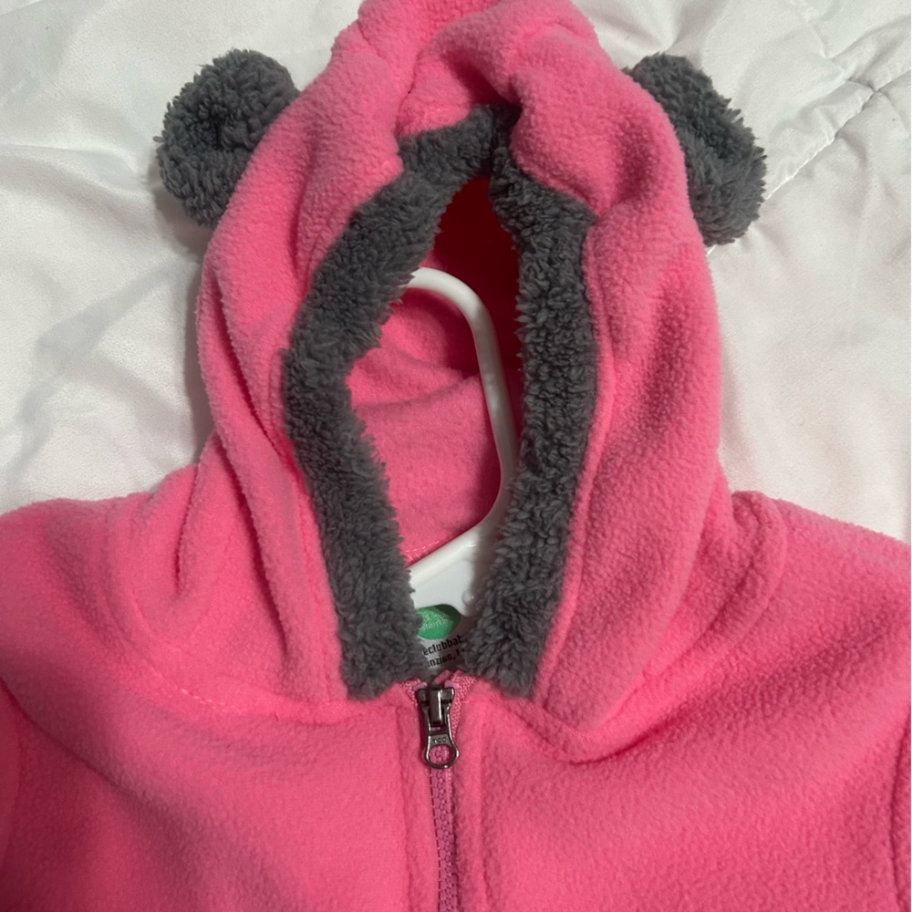 Teddy bear snow suit. Open arms and legs, but also can cover them. Versatile.